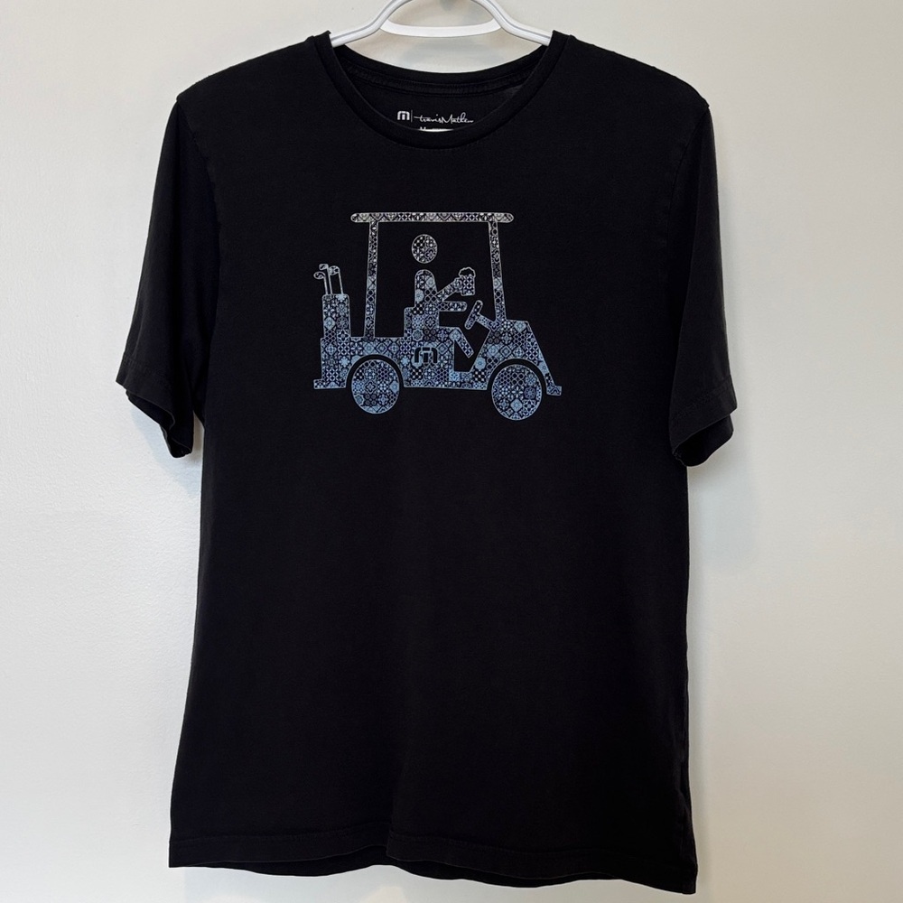 Travis Mathew Black Tee with Blue Golf Cart Graphic